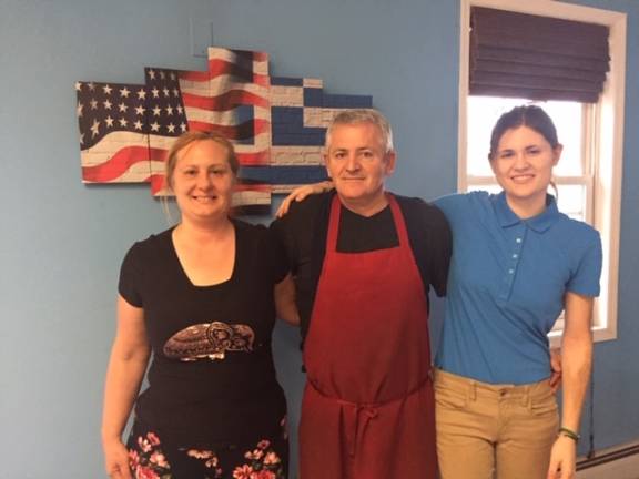 Yia Yia’s serves authentic Greek food with a cup of hospitality From left: Anastasia Zois, Yiorgos Hrissohoidis, and Eva Hrissohoidis (Photo by Marilyn Rosenthal)