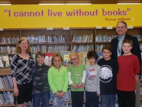 Cedar Mountain students complete reading challenge The students pictured above were presented with certificates and a book reward as a result of the program. Pictured are: Mrs. Maryellen Andersen, educational media specialist, Trevor Veloce, Alexis Provino, Jolene Jalbert, Jack Foco, Harry Malile, Kevin Coulther, and Mr. Dennis Mudrick, principal of Cedar Mountain School.