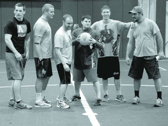 Locals battle it out in dodgeball compeitition for charity Team portrait of "Not In The Face", the 1st Place winners from Franklin, Vernon and Jefferson.