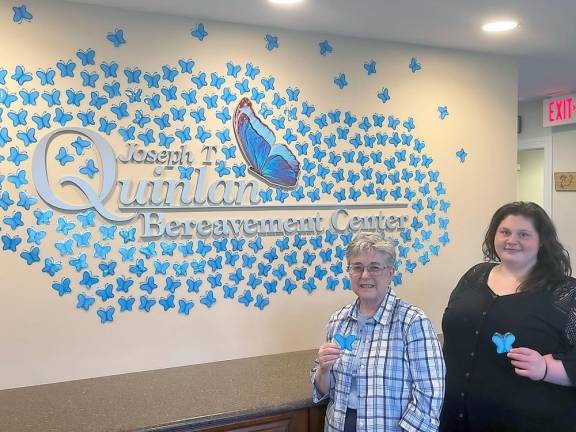 Nancy Moody and Angela Edson, bereavement counselors at the Joseph T. Quinlan Bereavement Center, hold the “Hope” butterfly (Photo provided)