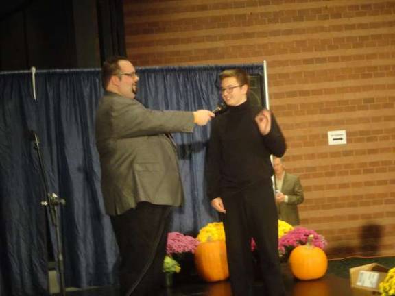 Harvest Fest raises funds for the Growing Stage Children's Theater Growing Stage Audience Development Director Danny Campos interviews Little Mermaid cast member Dalton Allison, of Byram.
