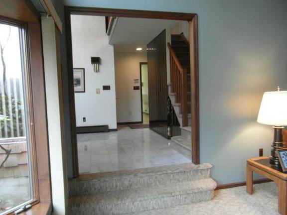 Contemporary colonial sits on parklike setting Contemporary colonial sits on parklike setting