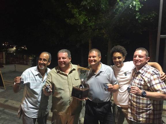 The winning bocce team: from left, Anthony Arbore, James Simonetti, Rod Mosner, Nick (officiator) and James Blesson.