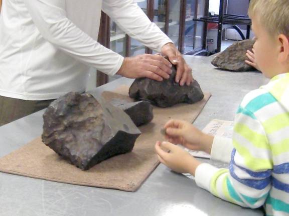 A close encounter with the museum's meteorites (Photo by Janet Redyke)