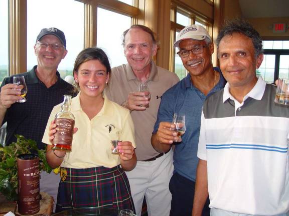 Golfers enjoy the Balvenie Scotch at the Awards Party in Owen&#x2019;s Pub