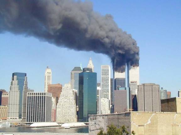Smoke billows from the World Trade Center towers in Lower Manhattan during the September 11 attacks.(Wikipedia Creative Commons)
