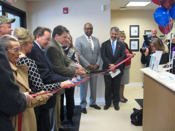 Urgent care center holds grand opening St. Clare, town officials and distinguished guests cut the red ribbon opening the Sussex Community Urgent Care Center.