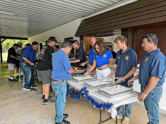 Hamburg. 12th annual Veterans Picnic VP1 State and county officials dish out food during the 12th annual Veterans Picnic on Saturday, Aug. 16 at the Hamburg Fire Department Pavilion. (Photo courtesy of Mike Inganamort)