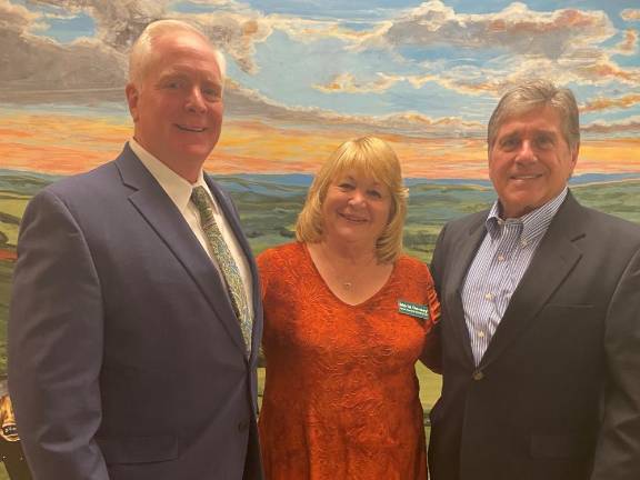 Vernon Township Woman’s Club President Maria Dorsey chats with Sussex County Clerk Jeff Parrott (left) and County Surrogate Gary Chiusano following their presentation about programs and services administered by their offices.