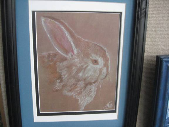 An extremely detailed rabbit was painted by Joyce Healy.