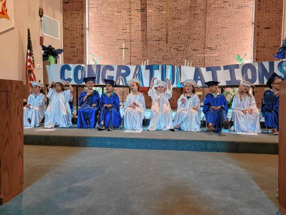 Preschool’s last graduation The preschool graduates sit on the altar of the Lutheran Church of Our Savior in Stanhope.