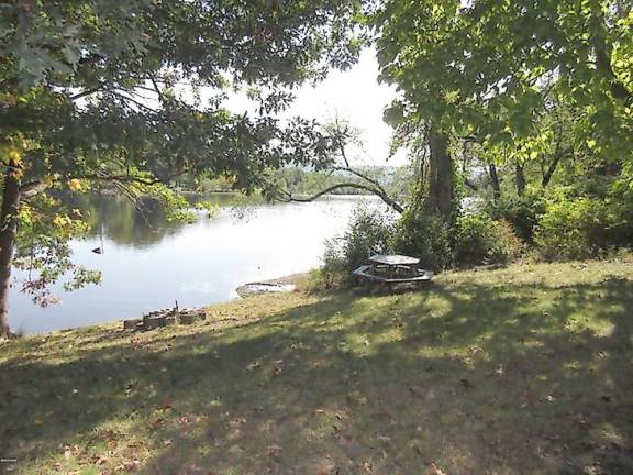 Enjoy fishing and kayaking from your updated riverfront home Enjoy fishing and kayaking from your updated riverfront home