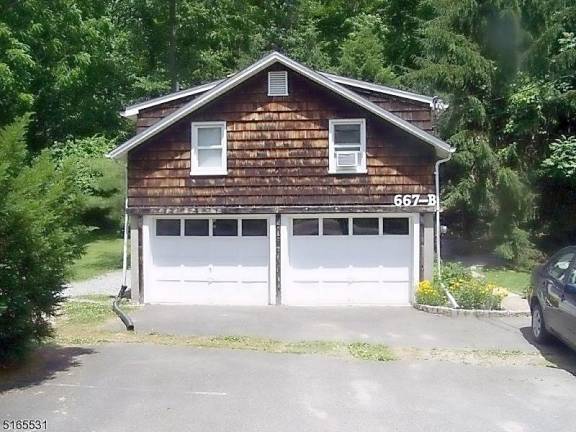 Ranch house on 1.5 acres has income potential Ranch house on 1.5 acres has income potential