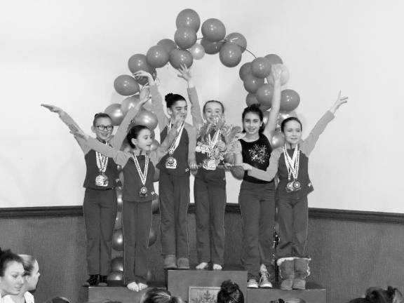 The first-place silver team award winning team of Ciara Peselli, Shea Cina, Meagan Ward, Meghan Smith, Jadyn DePaolo and Katie Hlywa is shown.