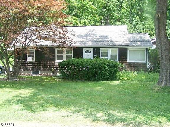 Ranch house on 1.5 acres has income potential Ranch house on 1.5 acres has income potential