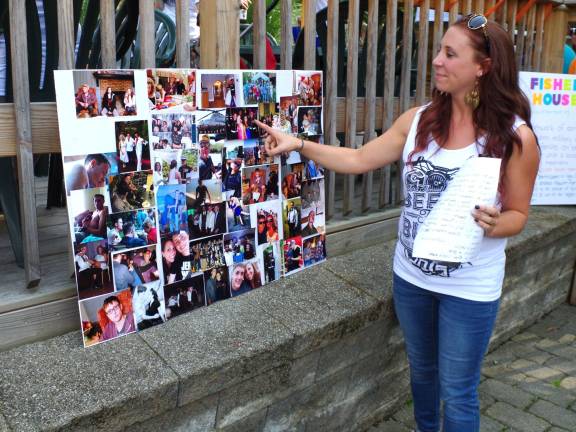 Vernon resident Krissy Buccieri points to one of her favorite photos of she and her husband Cpl. Alexander Buccieri, who died in a motorcycle accident on April 6, 2013.