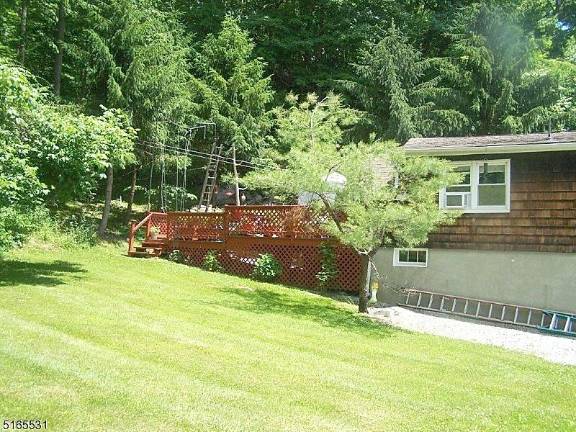 Ranch house on 1.5 acres has income potential Ranch house on 1.5 acres has income potential