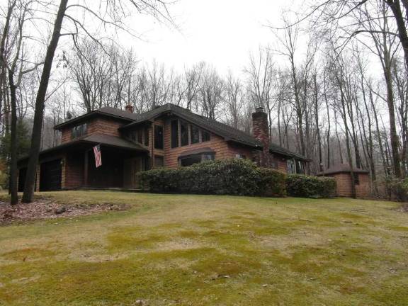 Contemporary colonial sits on parklike setting Contemporary colonial sits on parklike setting
