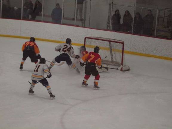 Pope John XXIII hockey tops Bergen Catholic Pope John forward Dylan Kuipers (24) scores in the third period.