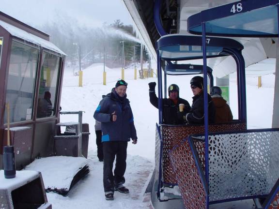 Lift Operations Manager &#x201c;Mr. Pete&#x201d; &amp; snow makers give a &#x201c;thumbs up&#x201d; that the lifts are ready to spin