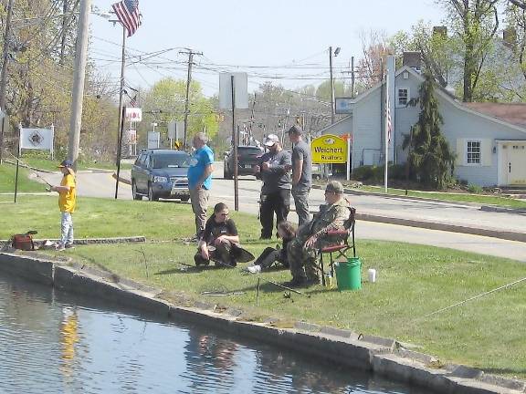 A beautiful day for fishing Anglers enjoy the day at Fireman’s Pond (Photo by Janet Redyke)