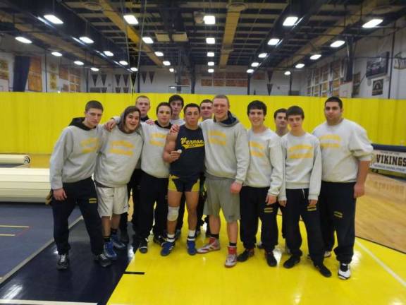 Vernon wrestlers rolling into February Photo by George Leroy Hunter The Vernon Viking's Jerrain Arroyo (holding cupcake) celebrated his birthday with a victory in the 152 pounds weight class and a post-match portrait with his teammates. Arroyo turned 18 years old.