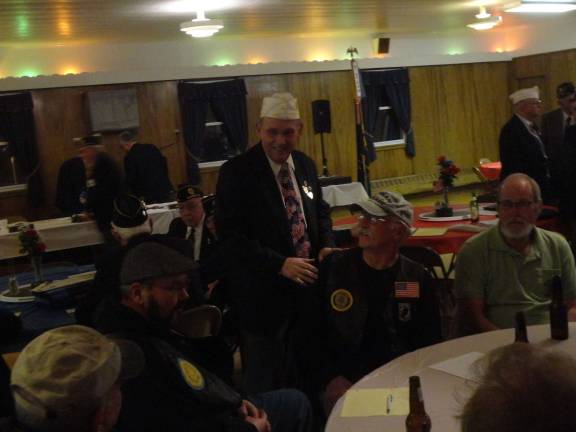 County Legion posts come together to support veterans’ recovery Photo by Scott Baker American Legion State Commander James Amos visits with local post members.