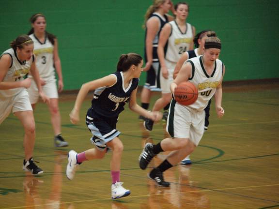 Sussex Tech holds off Warren Tech Sussex County Tech's Jill Blakeney is shown with the ball.