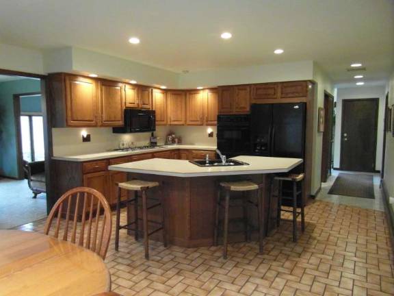 Contemporary colonial sits on parklike setting Contemporary colonial sits on parklike setting