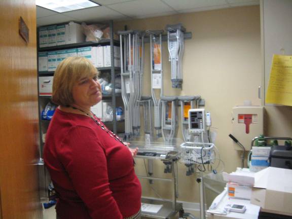Urgent care center holds grand opening Rebecca Perrault displays the center’s supply room or a she calls it the “crutch room.”