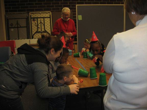 After Christmas Party means fun Competition is fierce during the cup blow down.