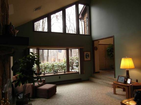 Contemporary colonial sits on parklike setting Contemporary colonial sits on parklike setting