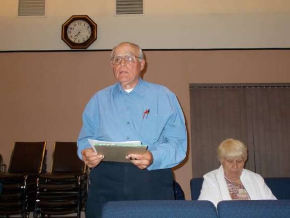 Photo by Vera Olinski Wantage resident William Gettler voices concern over countty tax numbers at a Wantage meeting on Oct. 9.