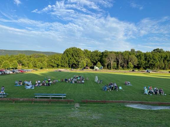 Residents brought chairs or blankets to sit on during the concert.