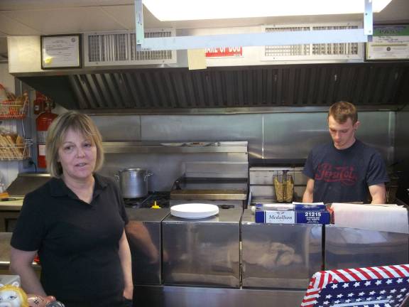 Owner June Martin with son Vincent at Jersey Dog.