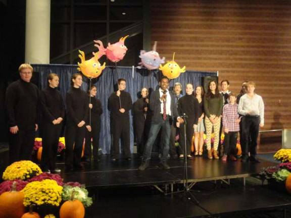 Harvest Fest raises funds for the Growing Stage Children's Theater The cast of the Little Mermaid sings Under the Sea.
