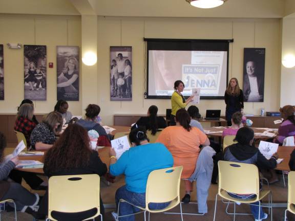 Local residents participate in an Enough Abuse Campaign training session.