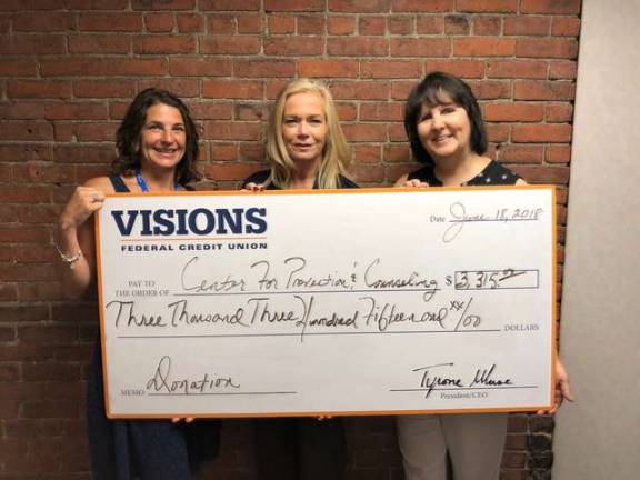 Visions makes donation to Center for Prevention From left, Tina Aue, Center for Prevention & Counseling, Elizabeth McDonough, Visions Federal Credit Union, Becky Carlson, Center for Prevention & Counseling