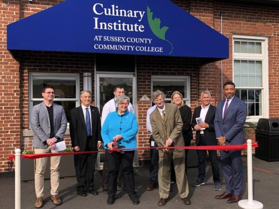 SCCC’s Culinary Institute opens Officials gather for a ribbon-cutting at Sussex County Community College’s Culinary Institute in Newton on Thursday, April 27. Holding the scissors are the Hon. Lorraine Parker, former chairwoman of the SCCC board of trustees, and Jon Connolly, the college president. (Photos by Kathy Shwiff)