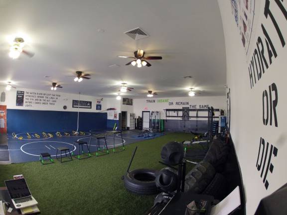 Local opens alternative fitness facility, creates exercise app The interior of The Compund, a fitness training facility in Lafayette.