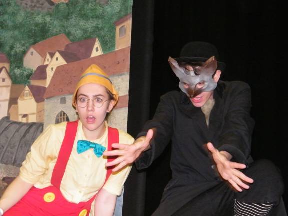 Photo by viktoria-Leigh Wagner Samantha Evans as Pinocchio, who is being hustled by the sly Mr. Fox, played by Maxwell Bennett.