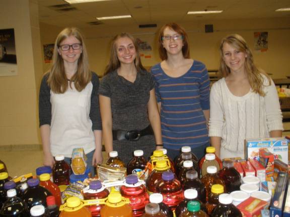 High Point students 'fill the bus' Photos by Allegra Sparta The student committee for the Fill the Bus event posing with the collection.