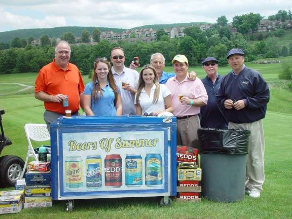 Crystal Springs Olivia Ganz and Casey Woodfinlevine host a &#x201c;Beer Station&#x201d; for golfers, supervised by Course Rangers.