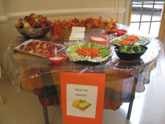 Healthy snacks entice those at the fair to eat healthy.