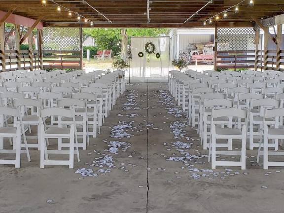 “It’s a crazy time for all these brides”: Sue-Ann Hansen, event coordinator, said the Fairgrounds Conservatory offers tent and barn options for weddings on short notice.