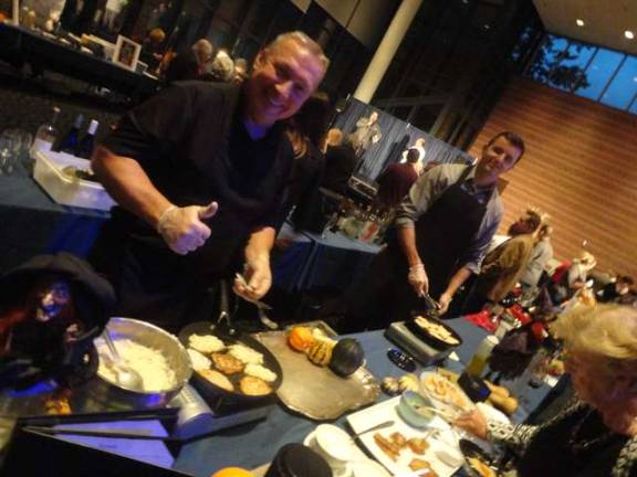 Photos by Scott Baker Jack Kaczynski, owner of Stanhope's Bell's Mansion, cooks up potato pancakes.