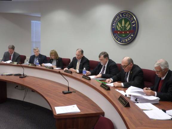 Sussex County Freeholder Gail Phoebus (third from left) at a February meeting of the Sussex County Board of Freeholders when the board voted to approve the solar panel project settlement. On the far left is Sussex County Administrator John Eskilson. On the far right is Sussex County Counsel Dennis McConnell. Photo by Nathan Mayberg