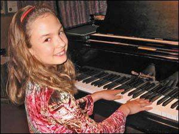 Third-grader a winning pianist Third-grader a winning pianist