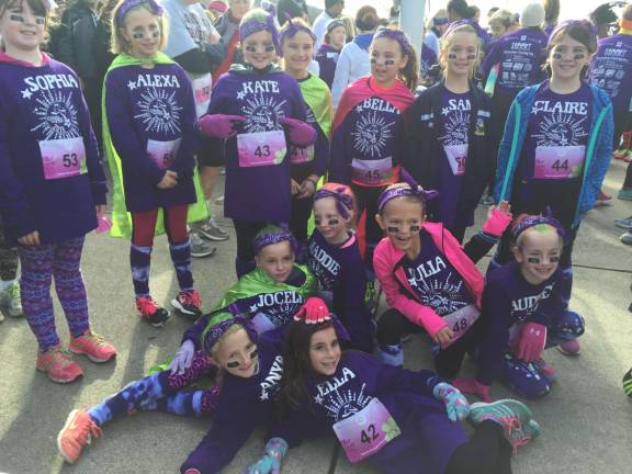 The Reverend Brown School's Girls on the Run team participated in the Fall GOTR 5K at Skylands Stadium on Saturday, Nov. 14. The girls were accompanied by their running buddies starting with the musical warm-up through to the finish line as they crossed home plate.