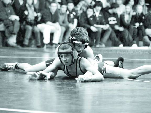 Sparta pins loss on Pope John Sparta's Garrett Gerndt on top of Pope John's Ryan Luchs in the 106 pounds category.